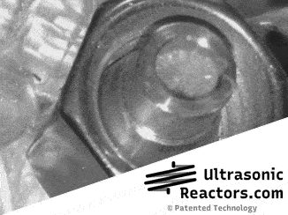 High-power ultrasound fluidizing a micropacked-bed reactor